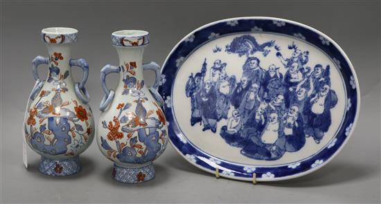 Two Imari vases and a blue and white dish
